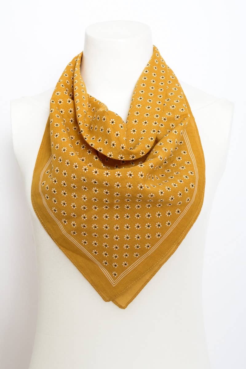 Mustard yellow patterned bandana styled on mannequin
