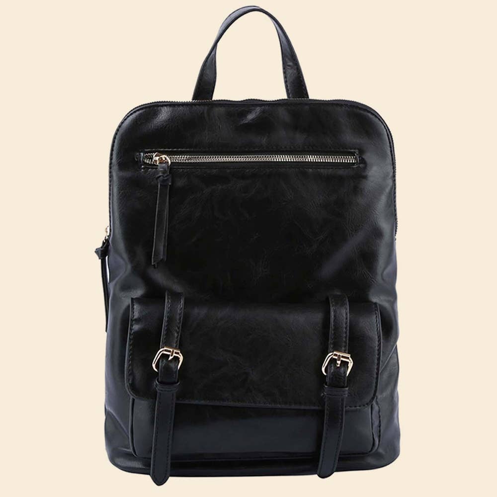 Black leather backpack with front zipper and buckle pocket on a beige background.