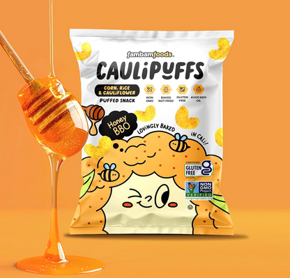 Bag of Caulipuffs Honey BBQ puffed snacks on an orange background with honey drizzling from a dipper.