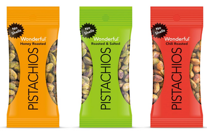 Three packages of Wonderful Pistachios No Shells in Honey Roasted, Roasted & Salted, and Chili Roasted flavors, displayed on a white background.