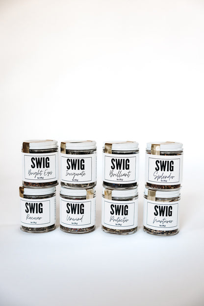 Nine SWIG loose leaf tea jars stacked in three rows on a white background, showcasing The Goodery’s full tea collection.