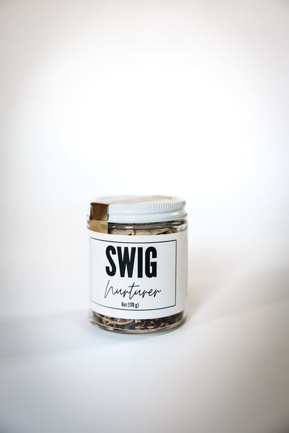 Glass jar of Nurturer loose leaf tea with Swig label from The Goodery.
