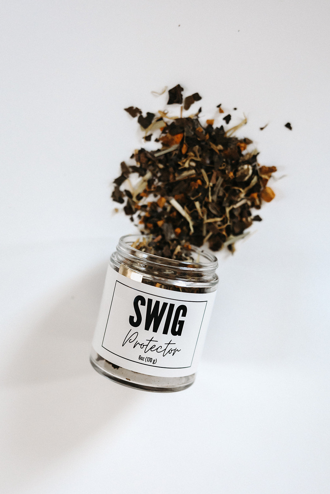 Swig Tea Protector immunity blend pouring from jar by The Goodery