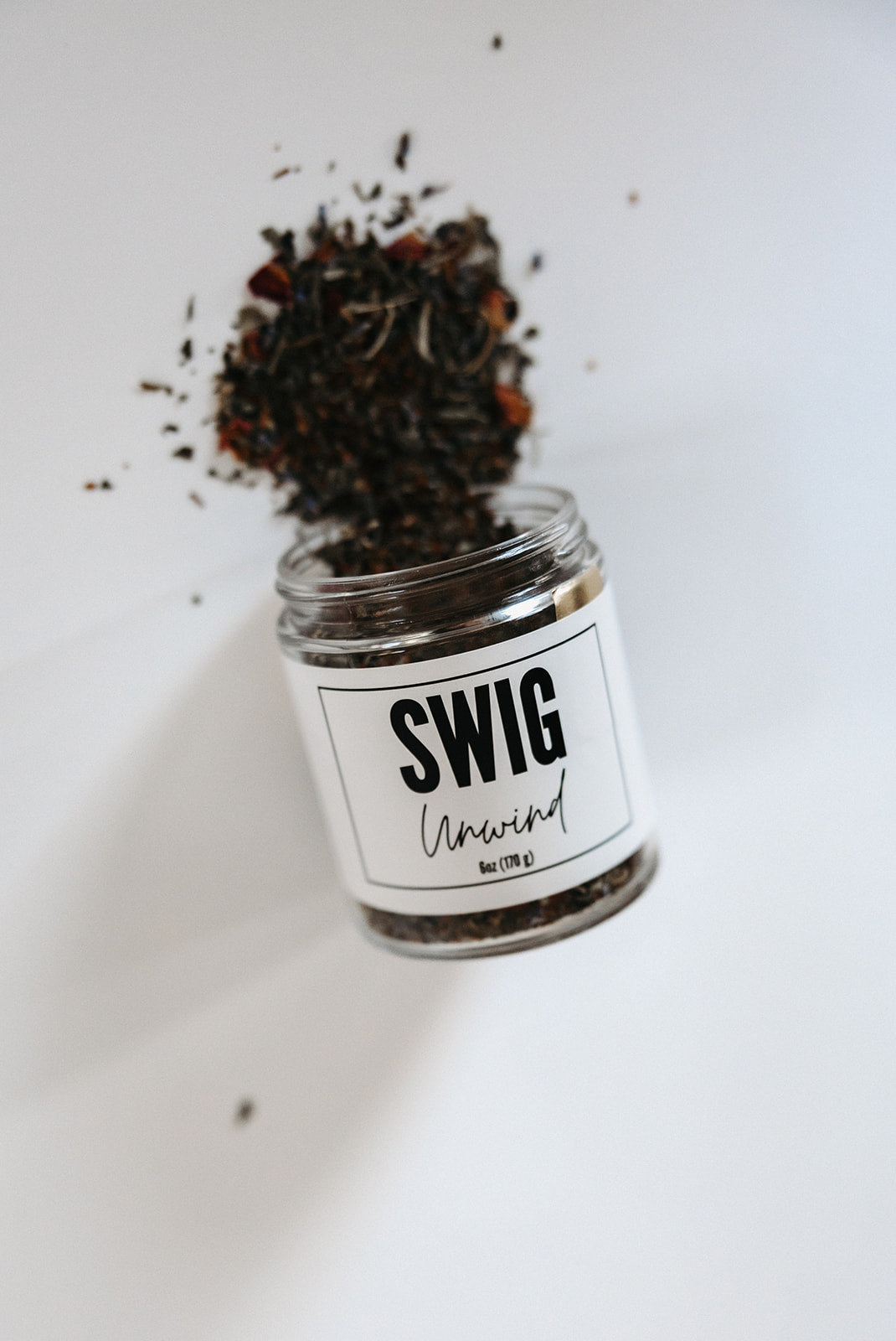 Swig Tea Unwind calming loose leaf tea spilling from jar by The Goodery