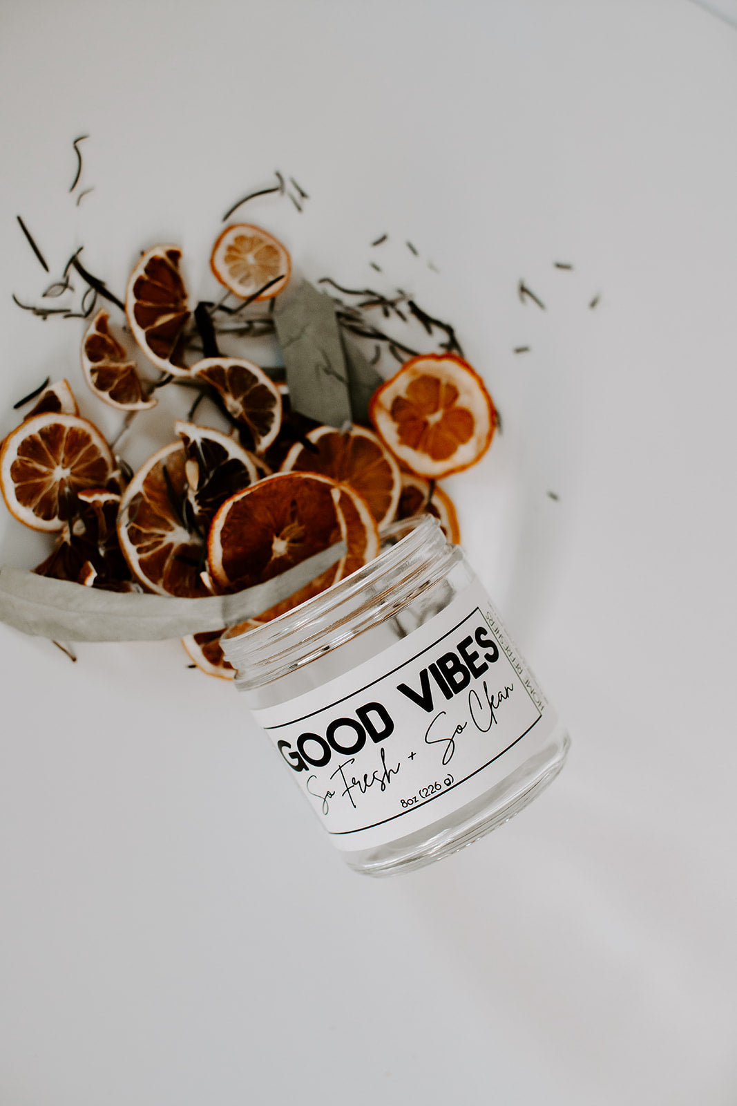 The Goodery Good Vibes stovetop simmer kit with dried orange slices and eucalyptus leaves styled on a white background.